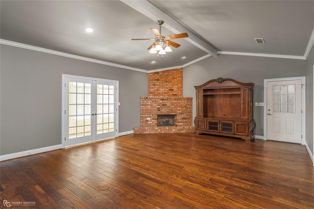 703 Airport Loop Homer, LA 71040 - Photo 3 of 29 Cathedral ceilings ~ wood burning fireplace