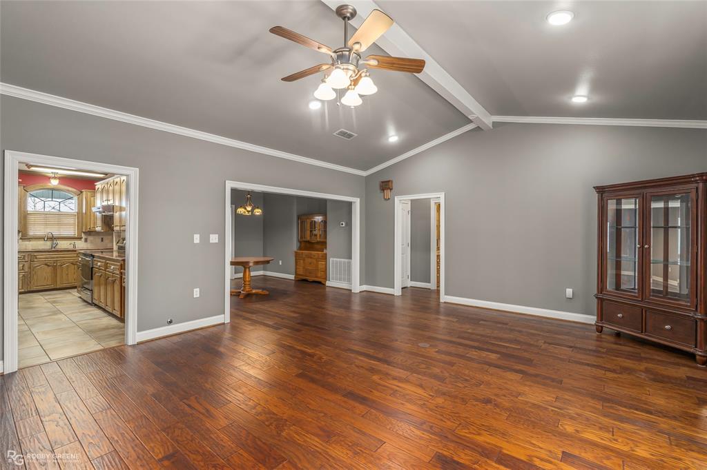 703 Airport Loop Homer, LA 71040 - Photo 4 of 29 Spacious living room with sunroom entry