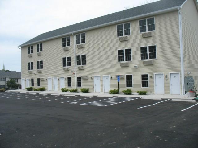 41 Grand Street, Unit 102 Danbury, CT 06810 - Photo 12 of 13 a front view of building with road