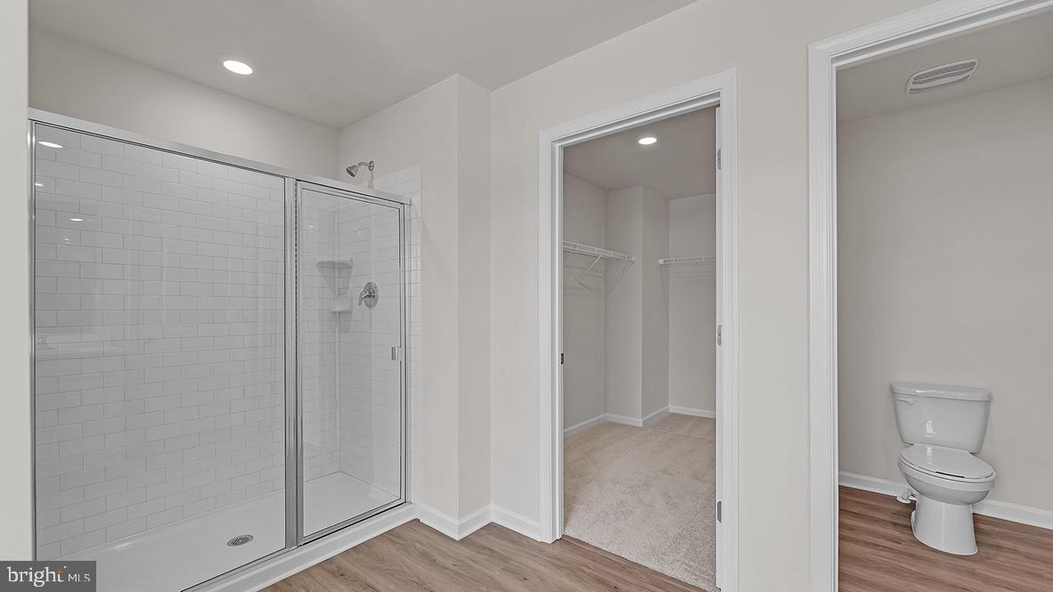 155 Littleworth Road Manahawkin, NJ 08050 - Photo 21 of 32 a bathroom with a shower and a toilet