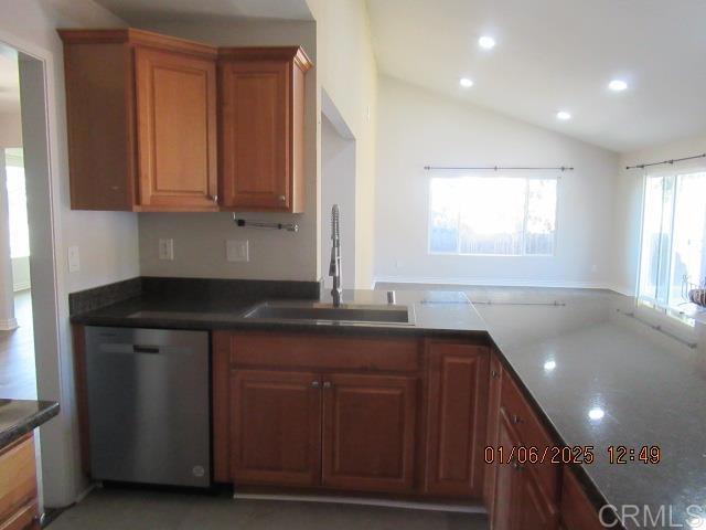 5957 Steeplechase Road Bonita, CA 91902 - Photo 3 of 8 a kitchen with a sink cabinets and window