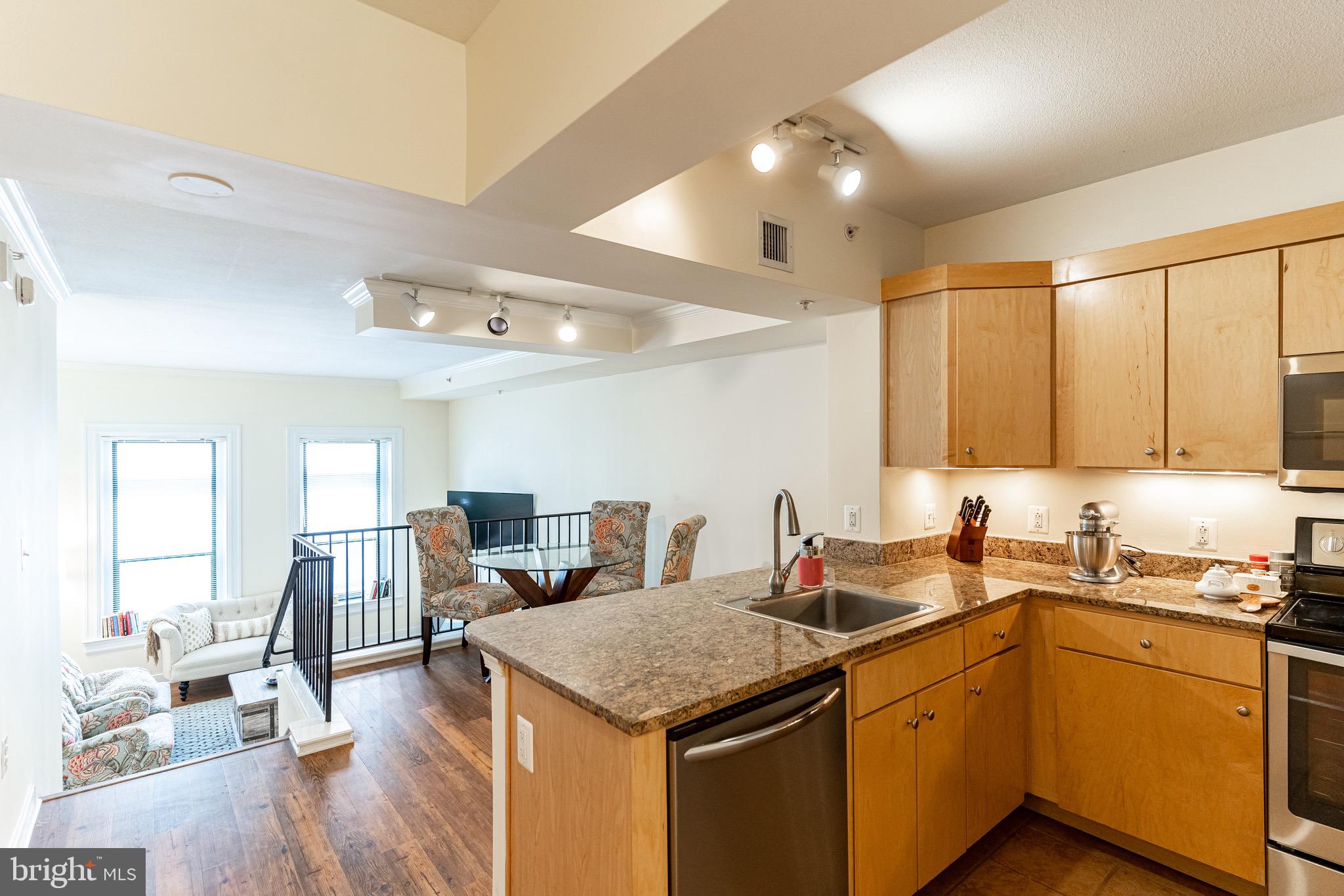 616 E Street Northwest, Unit 418 Washington, DC 20004 - Photo 5 of 55 Smart Split-Level creates separate Living Areas.