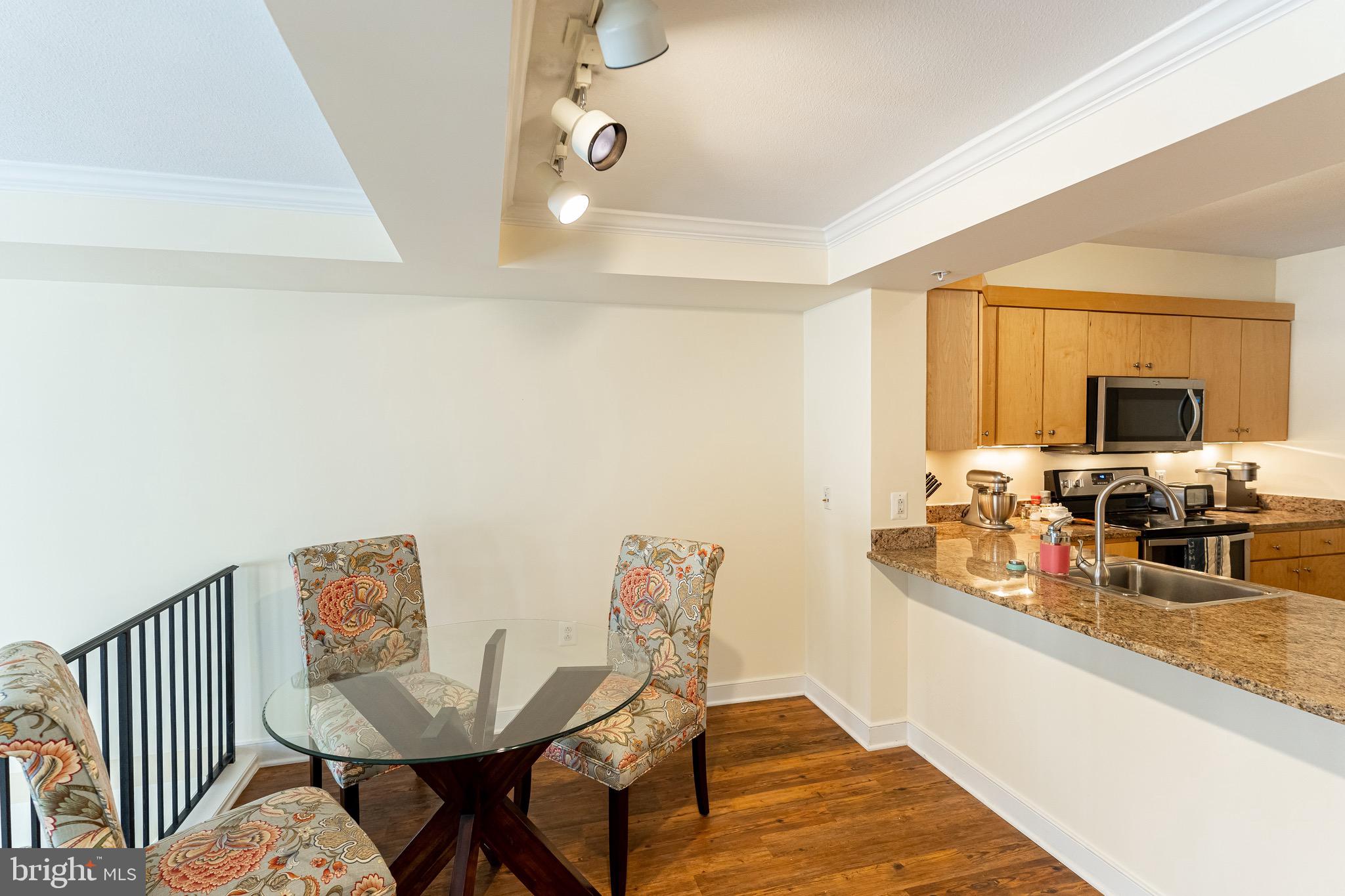 616 E Street Northwest, Unit 418 Washington, DC 20004 - Photo 8 of 55 Kitchen opens to Dining Area.