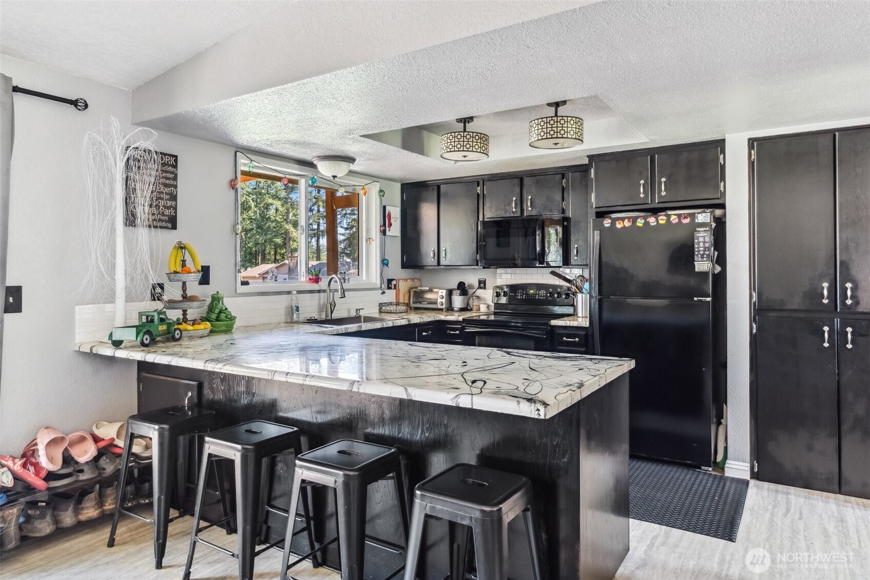 122 Fir Drive Chehalis, WA 98532 - Photo 11 of 34 a kitchen with stainless steel appliances granite countertop a sink refrigerator and cabinets