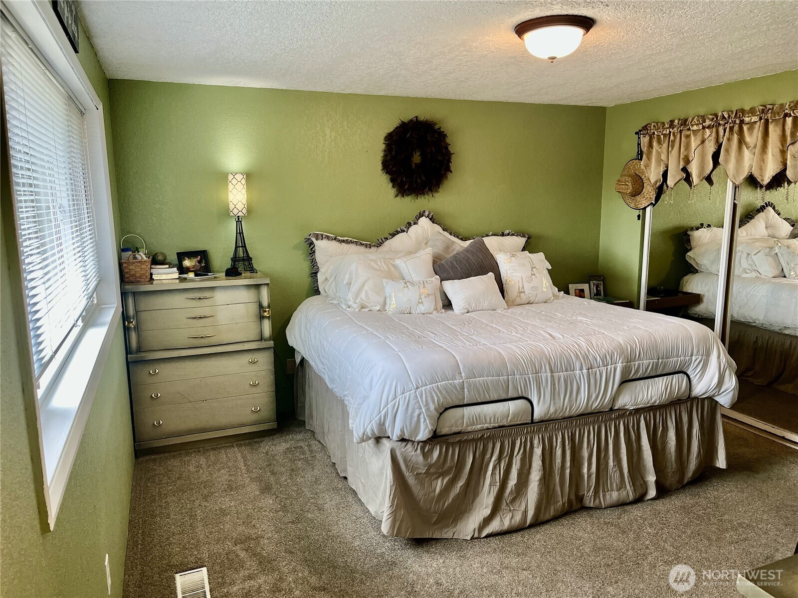 122 Fir Drive Chehalis, WA 98532 - Photo 16 of 34 a bedroom with a bed and a walk in closet