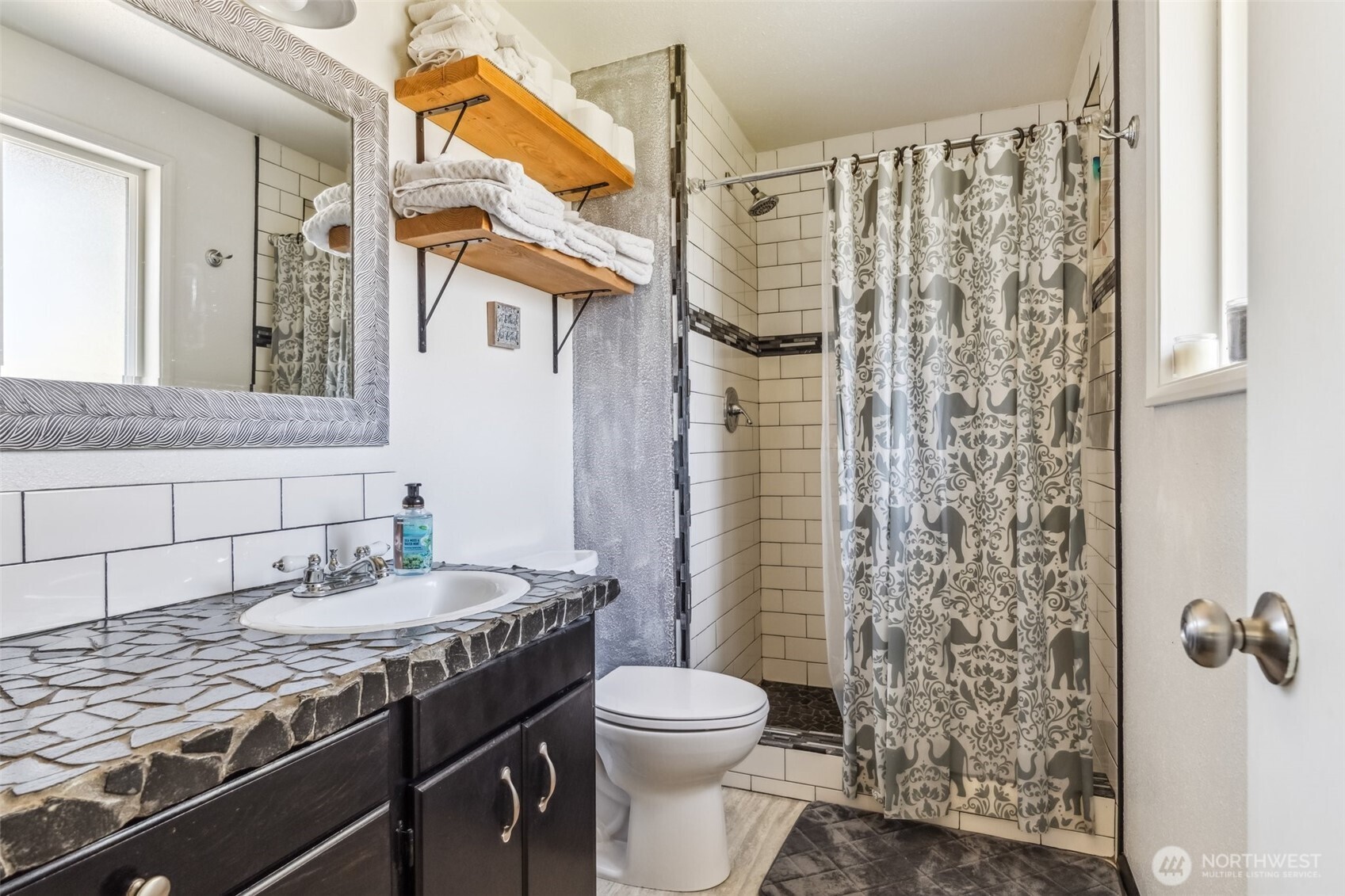 122 Fir Drive Chehalis, WA 98532 - Photo 18 of 34 a bathroom with a granite countertop sink toilet and shower