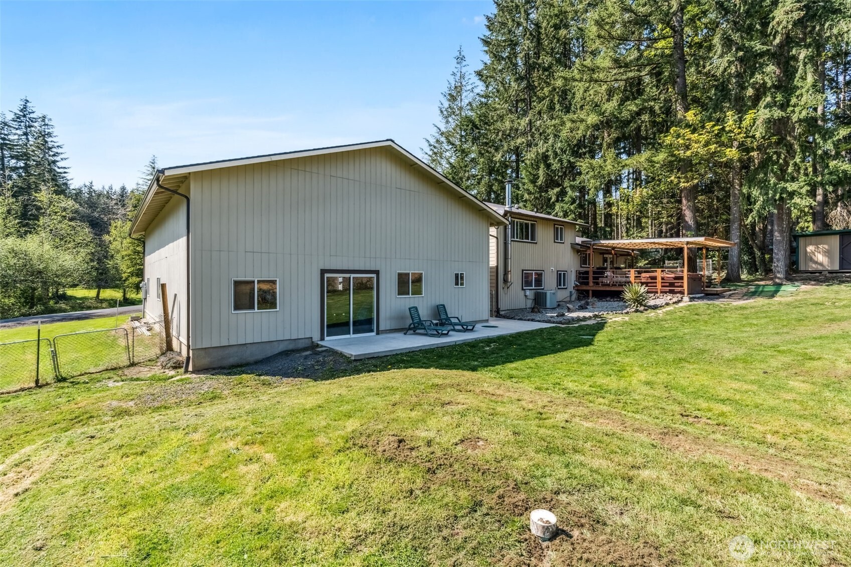 122 Fir Drive Chehalis, WA 98532 - Photo 29 of 34 a view of a house with a yard patio and fire pit