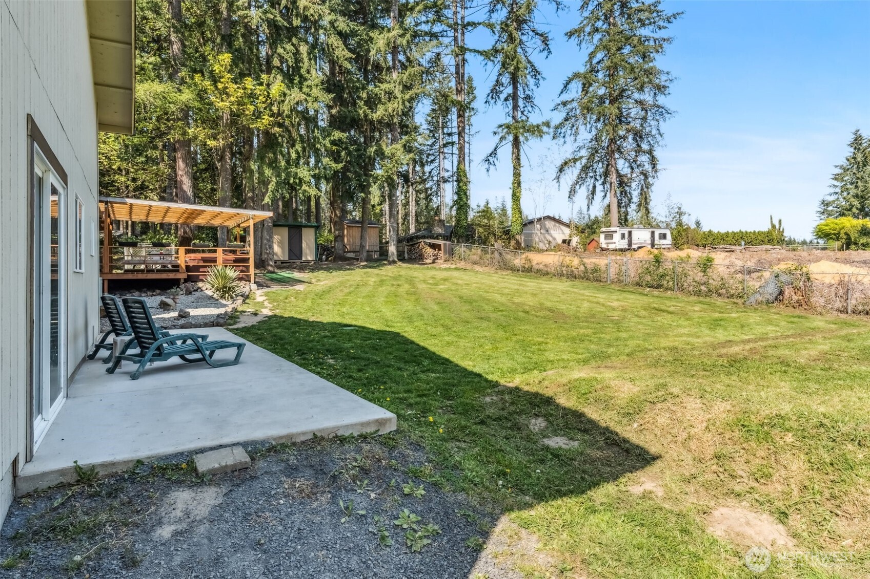 122 Fir Drive Chehalis, WA 98532 - Photo 30 of 34 a view of swimming pool with lawn chairs and outdoor seating