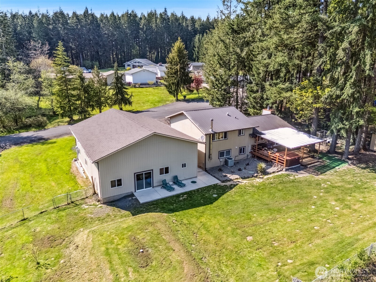 122 Fir Drive Chehalis, WA 98532 - Photo 32 of 34 a view of a house with pool and chairs