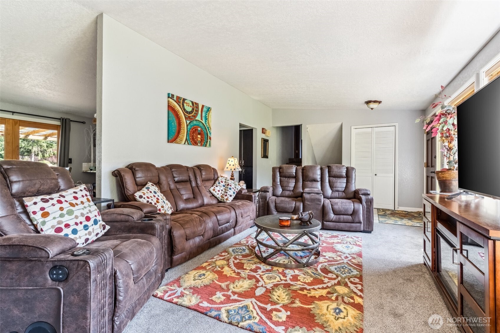 122 Fir Drive Chehalis, WA 98532 - Photo 6 of 34 a living room with furniture and a flat screen tv