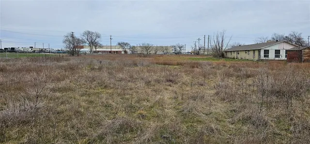 a view of a city with tall buildings in front of it