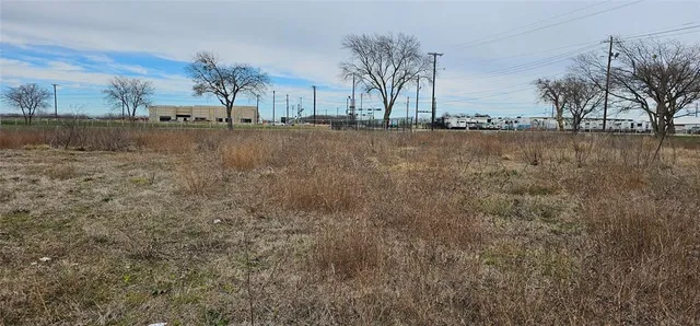 a view of a yard with an outdoor space