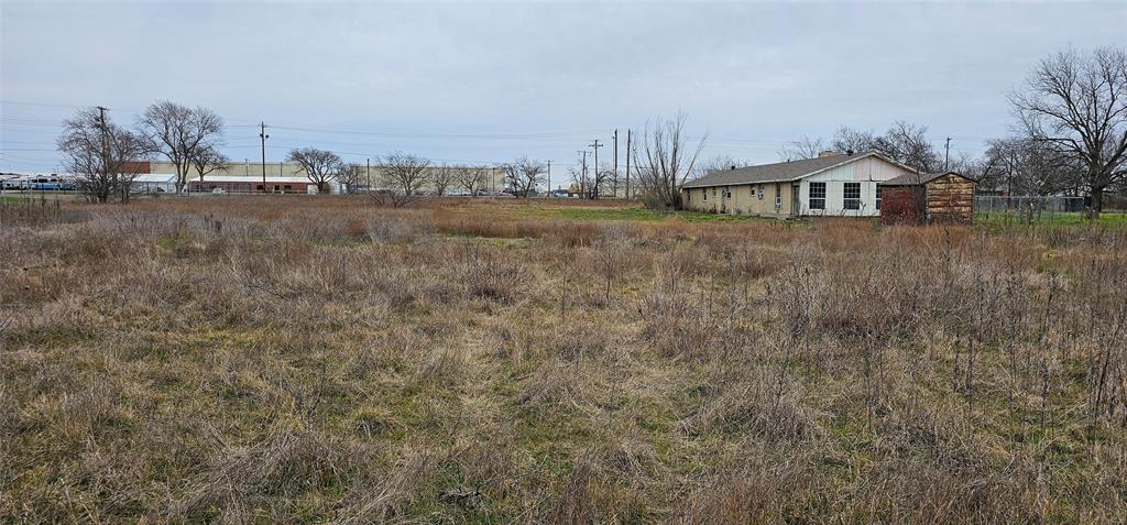 1401 North Masch Branch Road Denton, TX 76207 - Photo 9 of 9 a view of a big house with a big yard and large trees