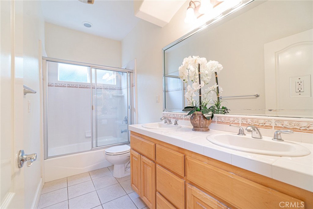2216 Clark Lane, Unit A Redondo Beach, CA 90278 - Photo 15 of 20 a bathroom with a sink a toilet and shower
