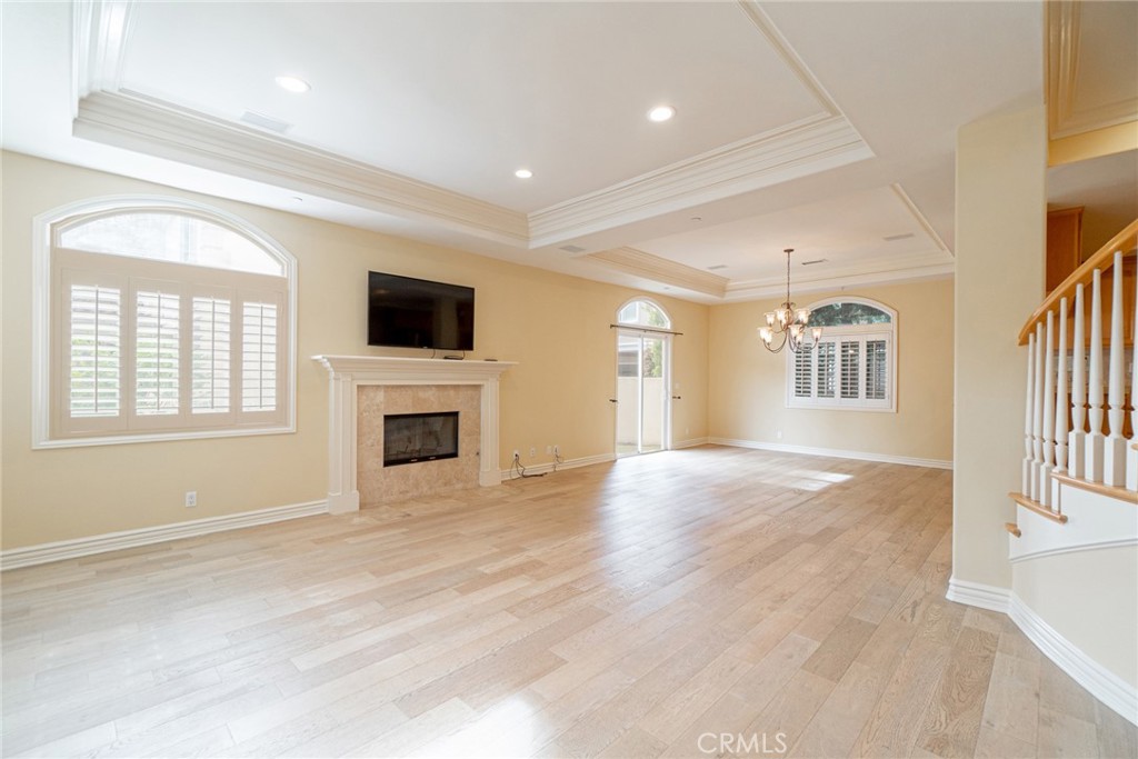 2216 Clark Lane, Unit A Redondo Beach, CA 90278 - Photo 3 of 20 a view of an empty room with a fireplace and a window