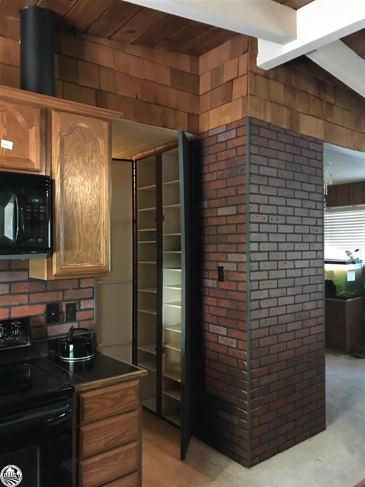 18191 Woodham Carne Road Sonora, CA 95370 - Photo 28 of 47 a bathroom with a sink and a mirror