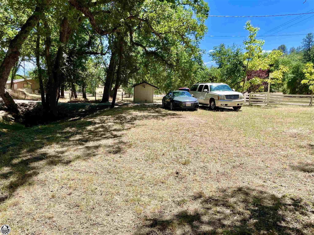 18191 Woodham Carne Road Sonora, CA 95370 - Photo 37 of 47 a car parked on the side of the road