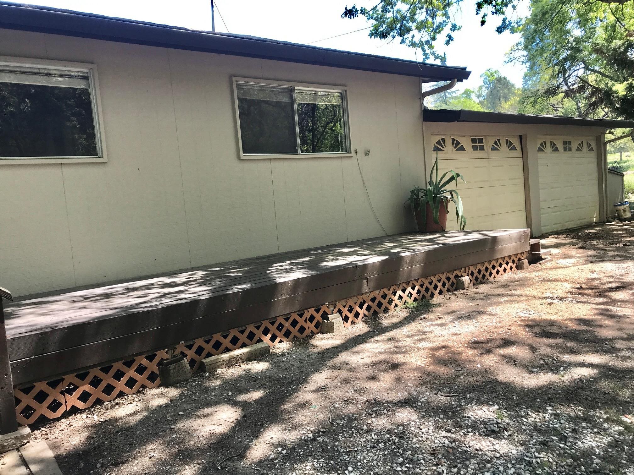 18191 Woodham Carne Road Sonora, CA 95370 - Photo 39 of 47 a view of backyard and wooden fence