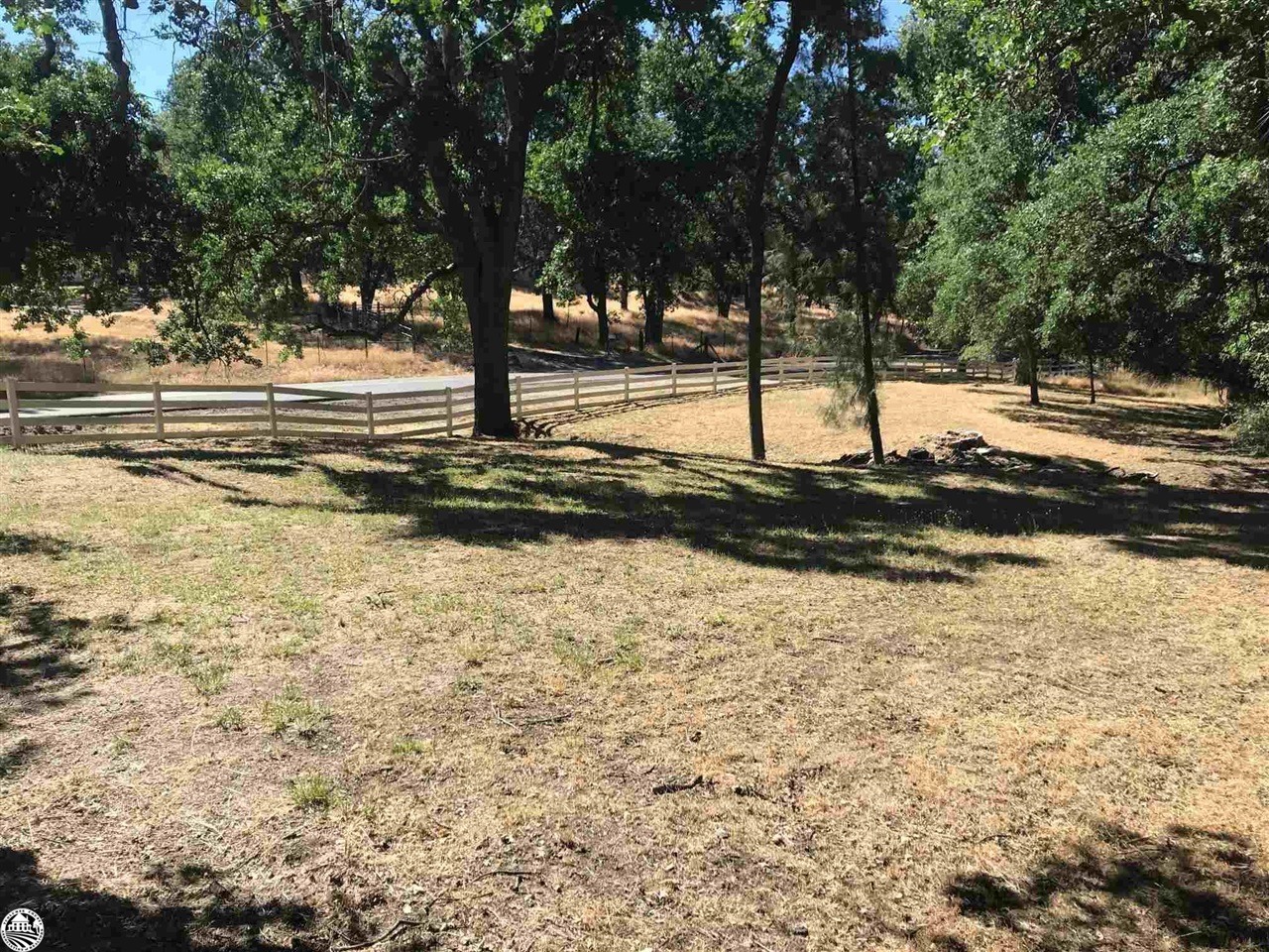 18191 Woodham Carne Road Sonora, CA 95370 - Photo 9 of 47 a view of a yard with trees