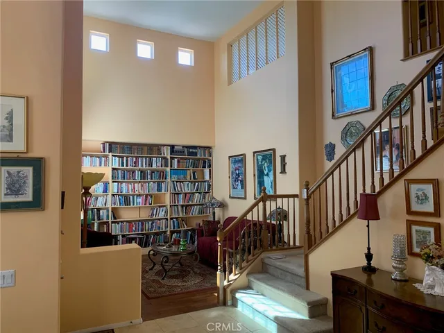 a view of a livingroom with furniture and entryway