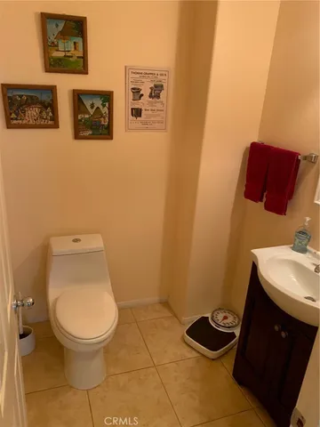 a bathroom with a toilet and a sink
