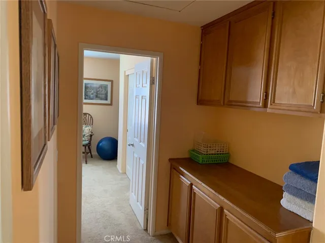a view of a storage & utility room in a laundry room