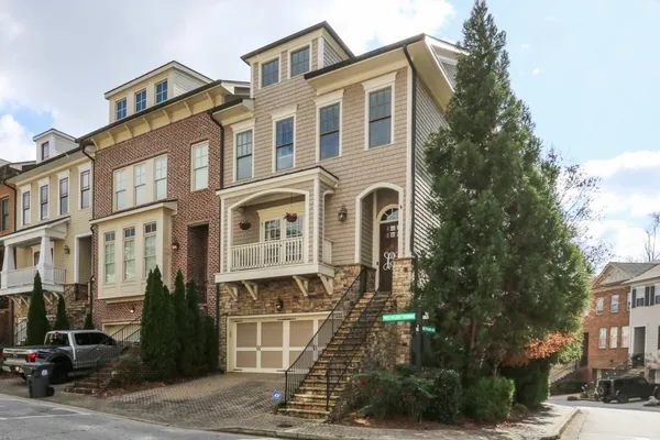 a front view of a building with street view