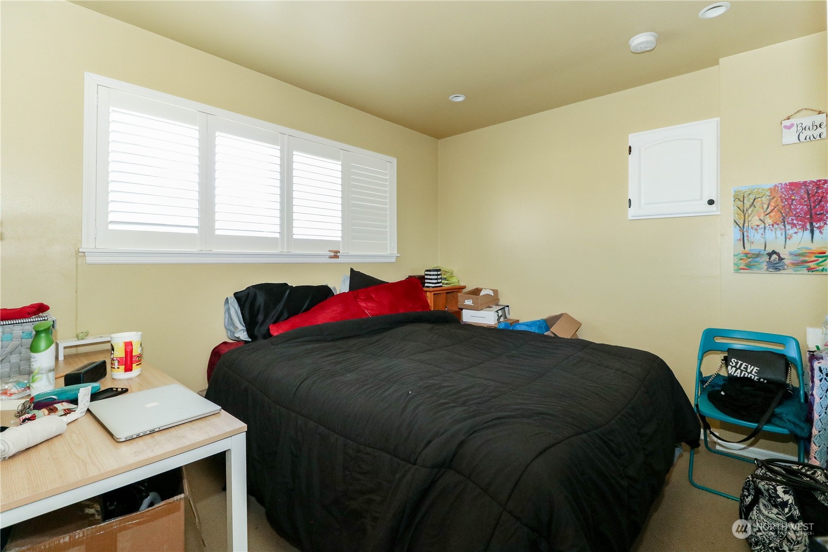 405 Northwest Market Street Seattle, WA 98107 - Photo 15 of 33 a bedroom with a bed and a table