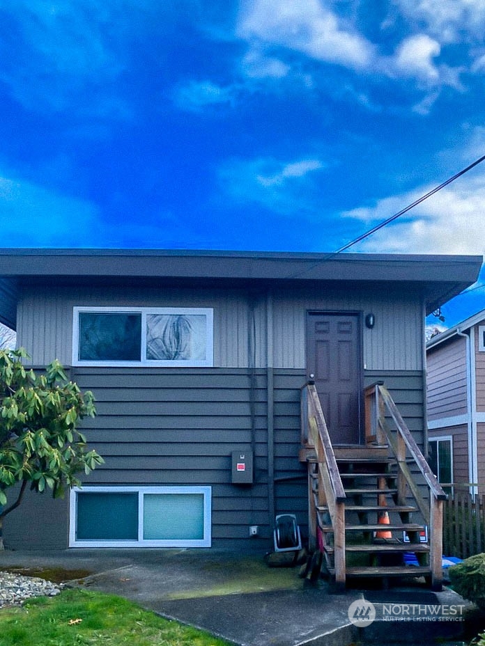 405 Northwest Market Street Seattle, WA 98107 - Photo 17 of 33 a side view of a house with a garage
