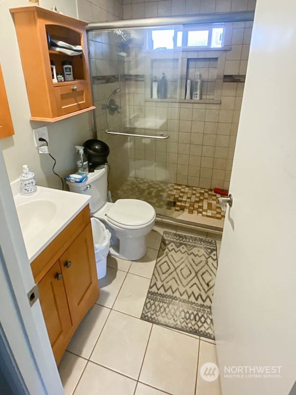 405 Northwest Market Street Seattle, WA 98107 - Photo 21 of 33 a bathroom with a toilet and a shower