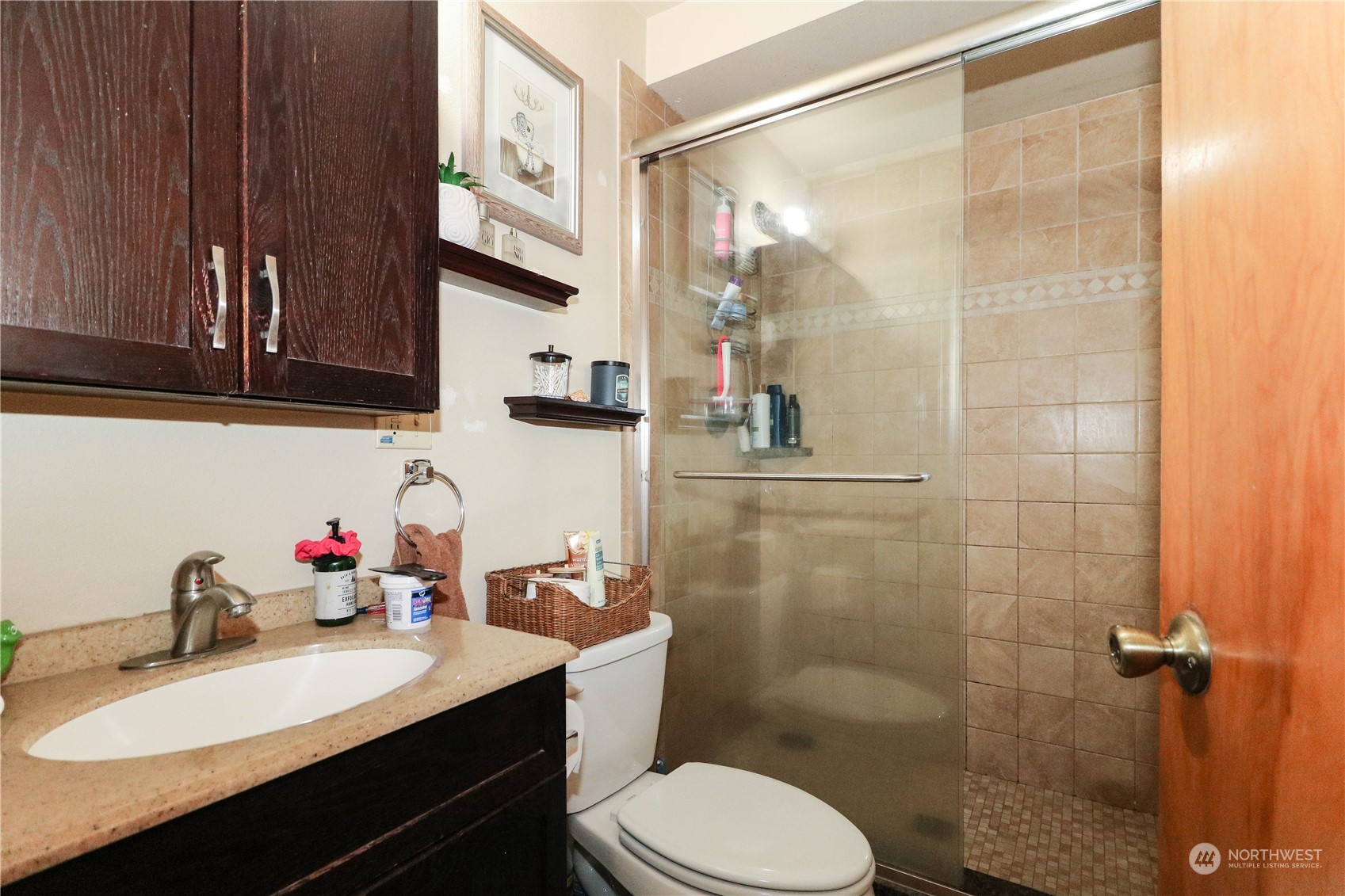 405 Northwest Market Street Seattle, WA 98107 - Photo 29 of 33 a bathroom with a sink a toilet and shower