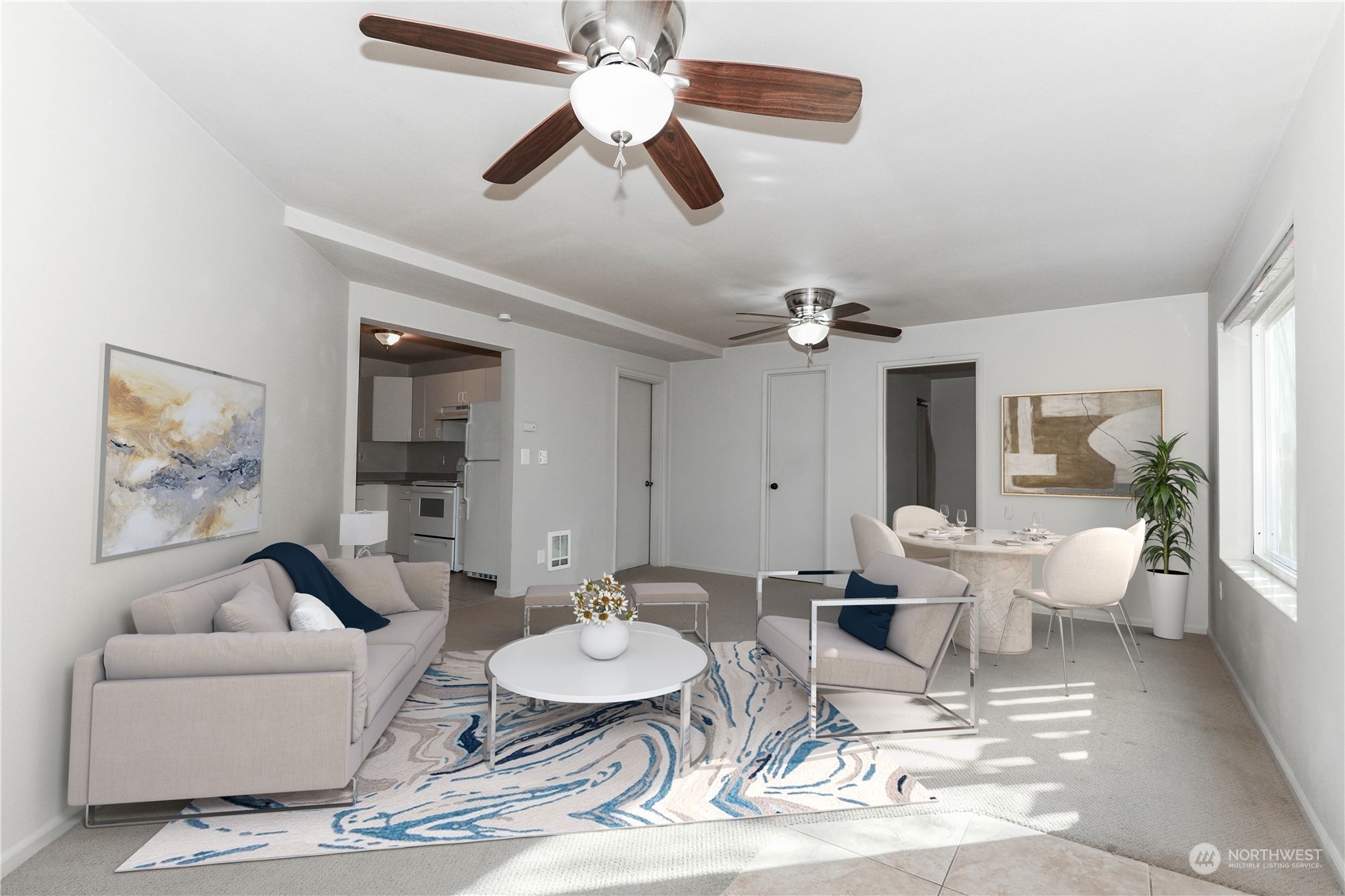 405 Northwest Market Street Seattle, WA 98107 - Photo 3 of 33 a living room with furniture a chandelier and a dining room