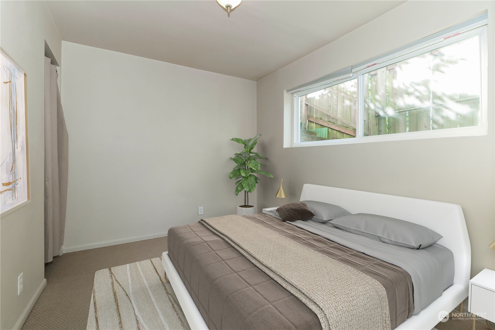 405 Northwest Market Street Seattle, WA 98107 - Photo 7 of 33 a bedroom with a bed and a window