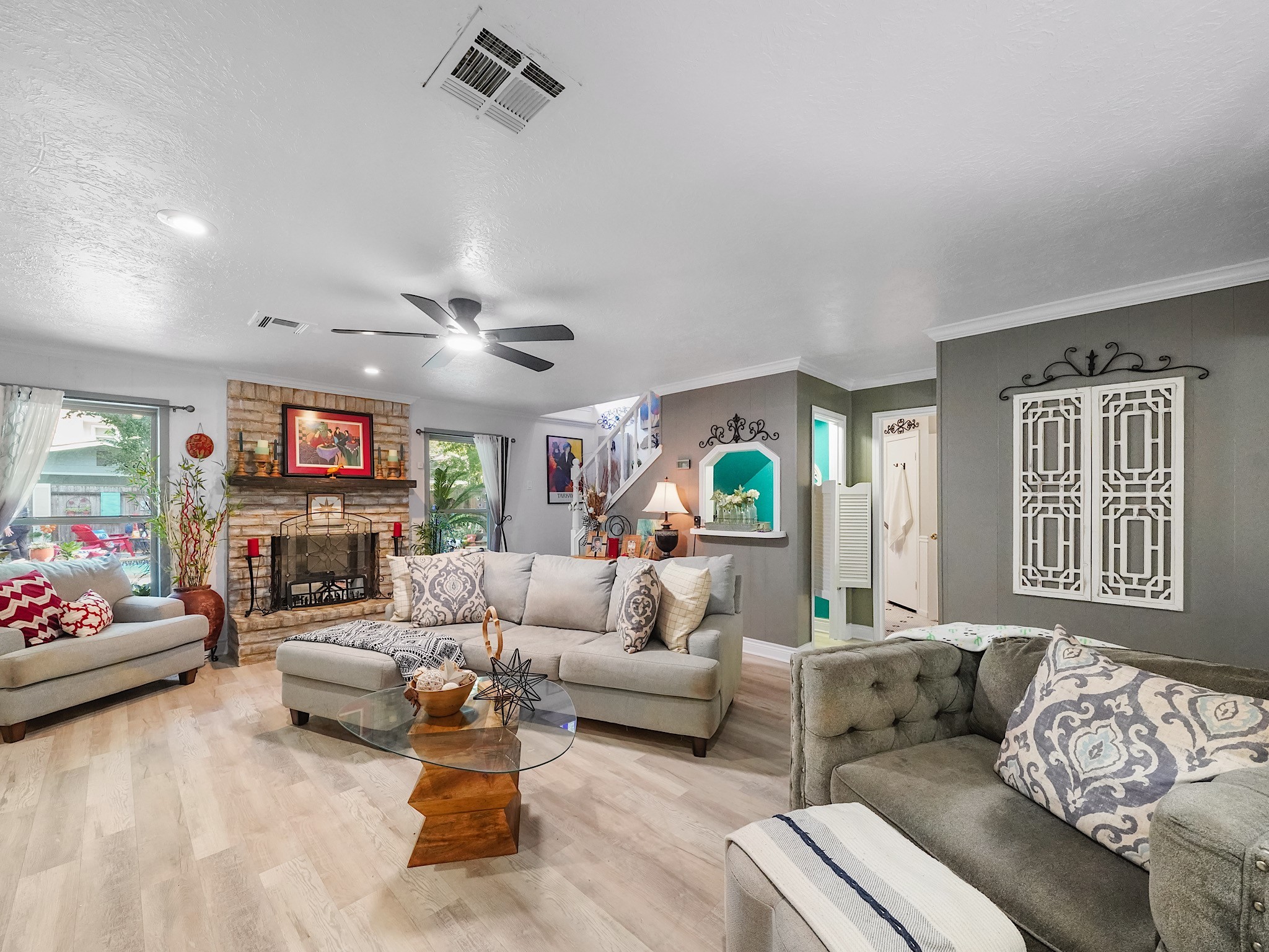 14014 Locke Lane Houston, TX 77077 - Photo 26 of 35 a living room with furniture and a flat screen tv