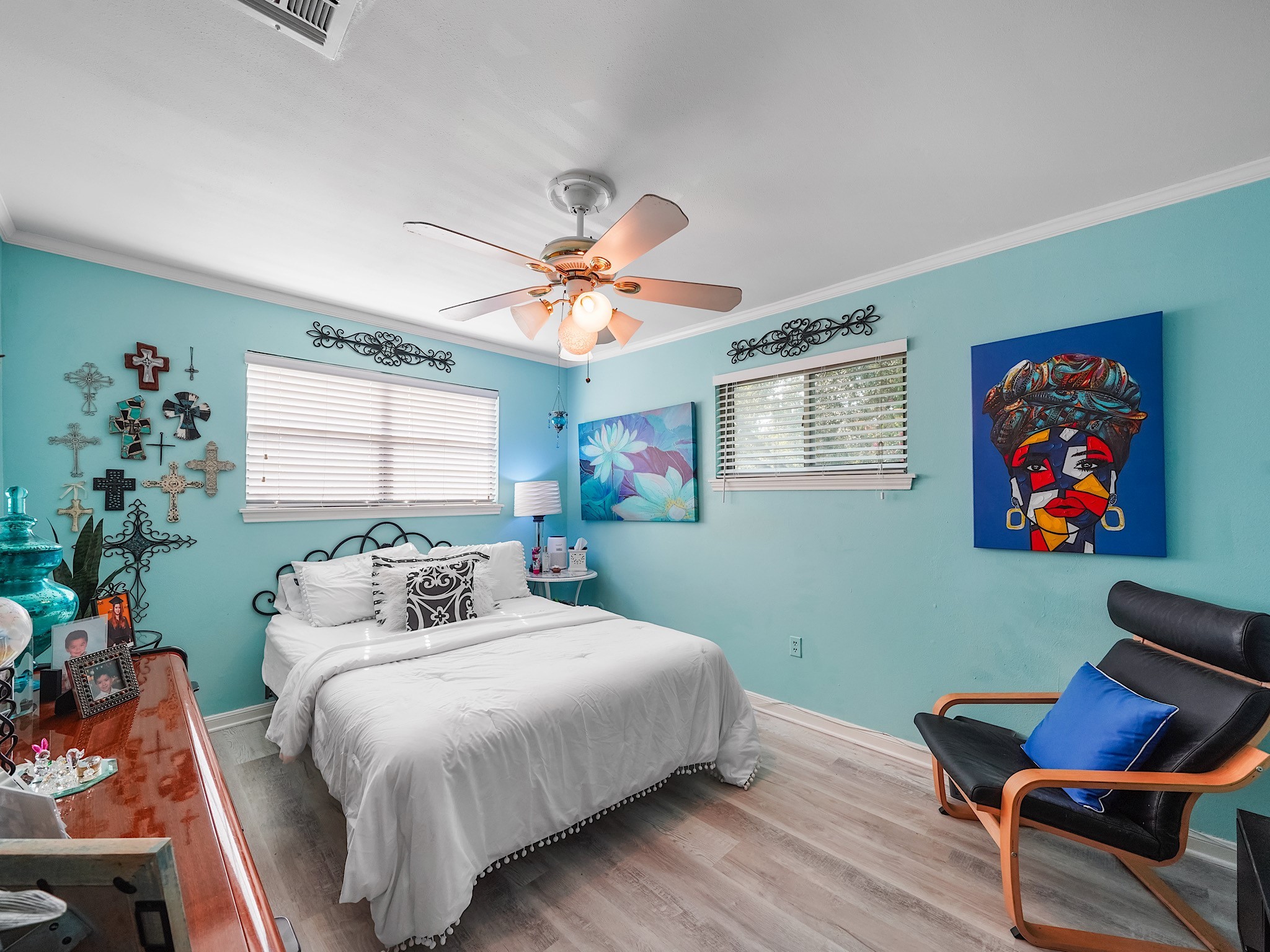 14014 Locke Lane Houston, TX 77077 - Photo 28 of 35 a bedroom with furniture and a chandelier