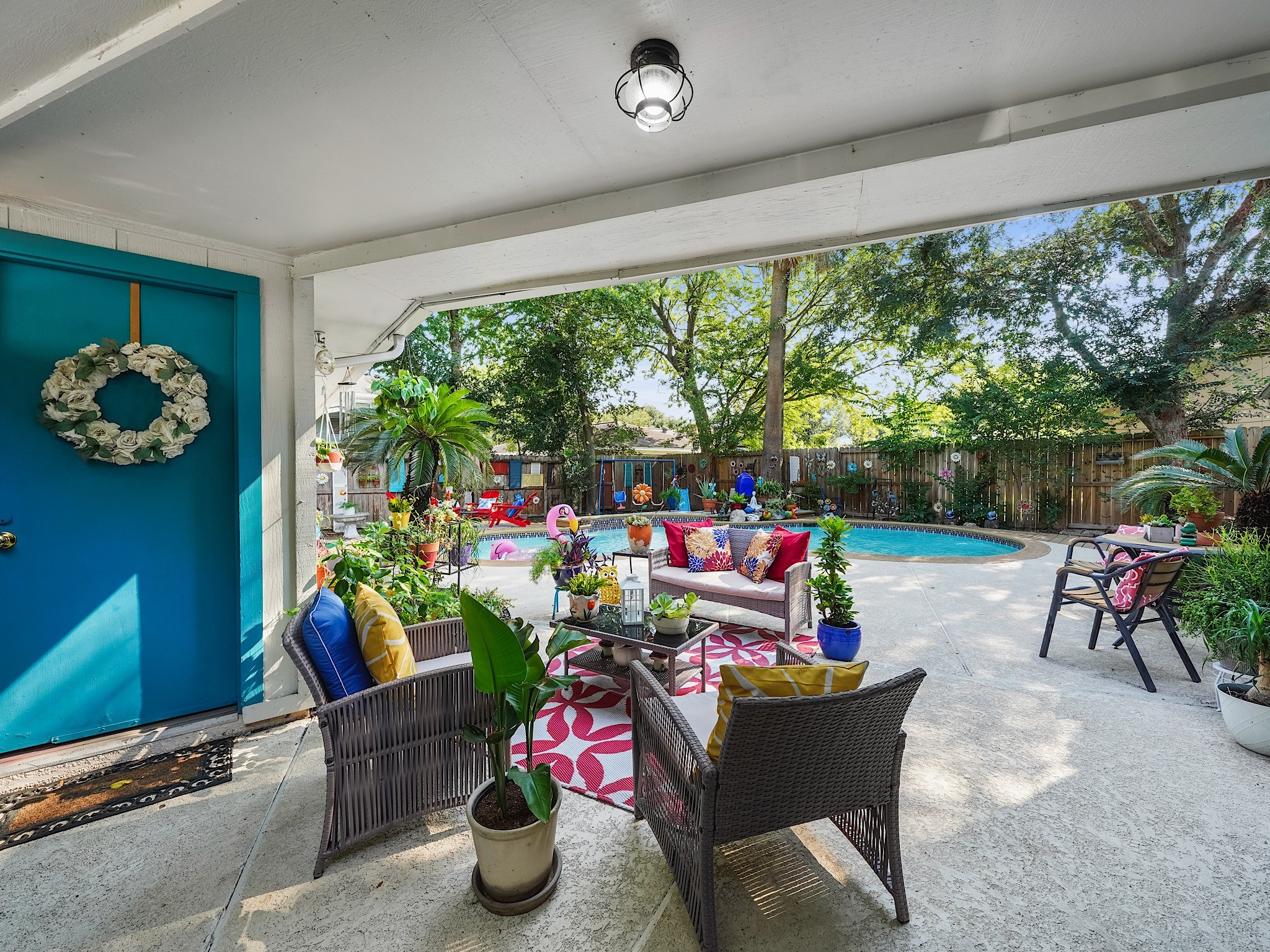 14014 Locke Lane Houston, TX 77077 - Photo 31 of 35 a living room filled with furniture and a floor to ceiling window