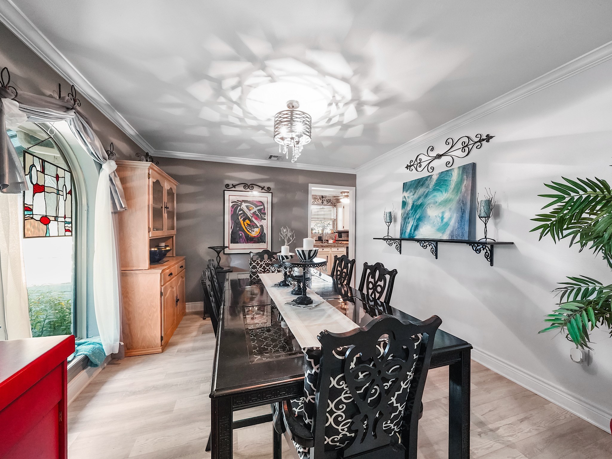 14014 Locke Lane Houston, TX 77077 - Photo 7 of 35 a view of a dining room with furniture window and wooden floor