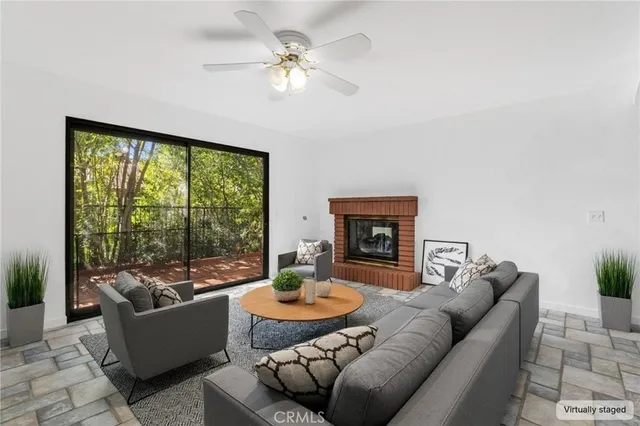a view of a room with a sink and cabinets