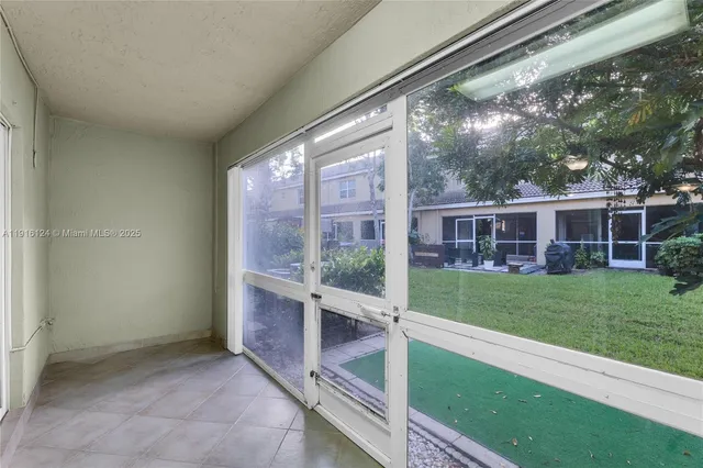 a view of a house with a garden