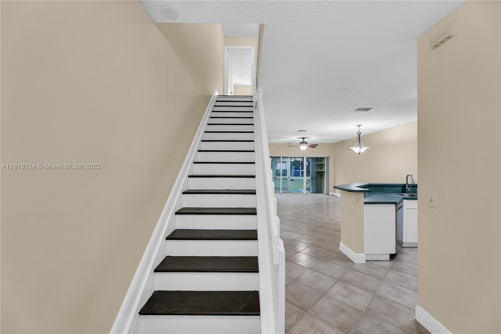 304 Southwest 120th Avenue, Unit 304 Pembroke Pines, FL 33025 - Photo 24 of 46 a view of entryway and hall with wooden floor