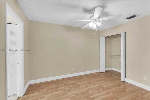 a bathroom with a sink double vanity and a shower
