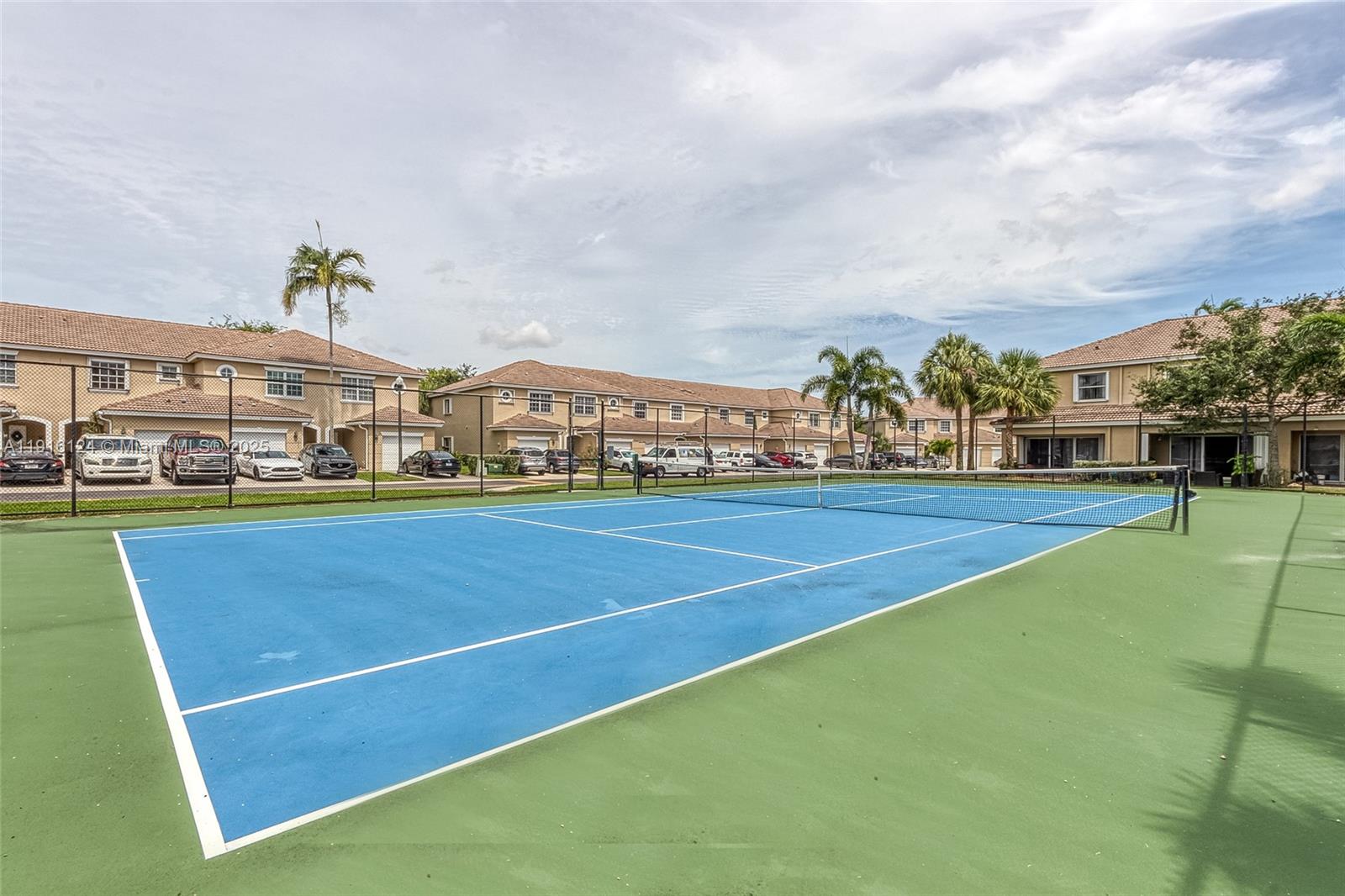 304 Southwest 120th Avenue, Unit 304 Pembroke Pines, FL 33025 - Photo 41 of 46 a view of a tennis court
