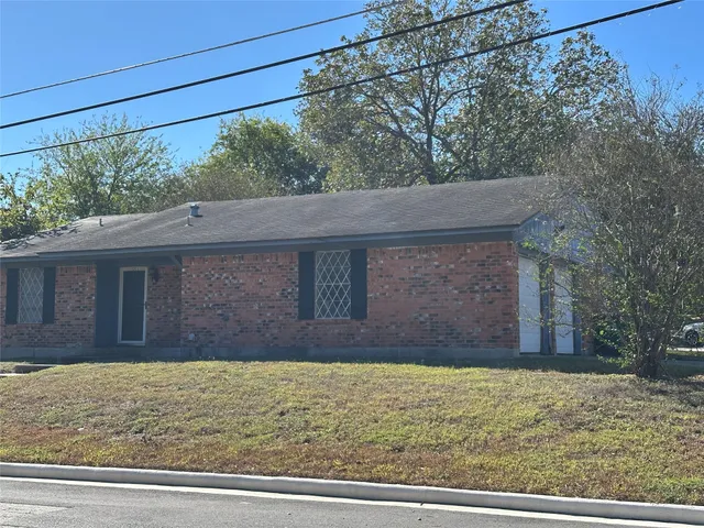 a view of house with outdoor space