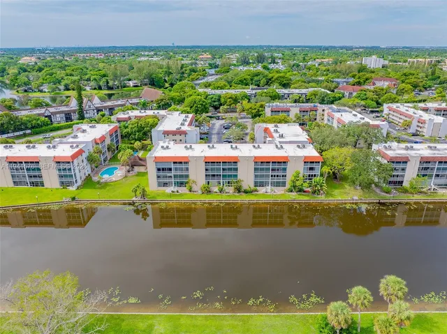 a picture of houses with outdoor space and swimming pool