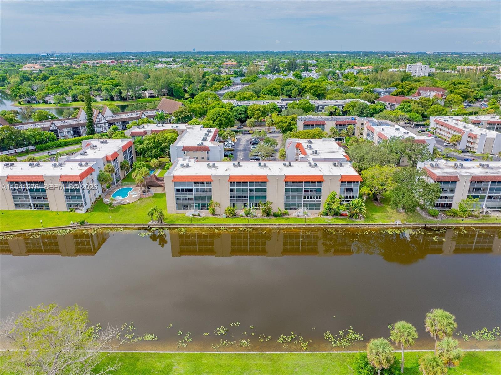 3581 Inverrary Drive, Unit 308 Lauderhill, FL 33319 - Photo 13 of 43 a picture of houses with outdoor space and swimming pool