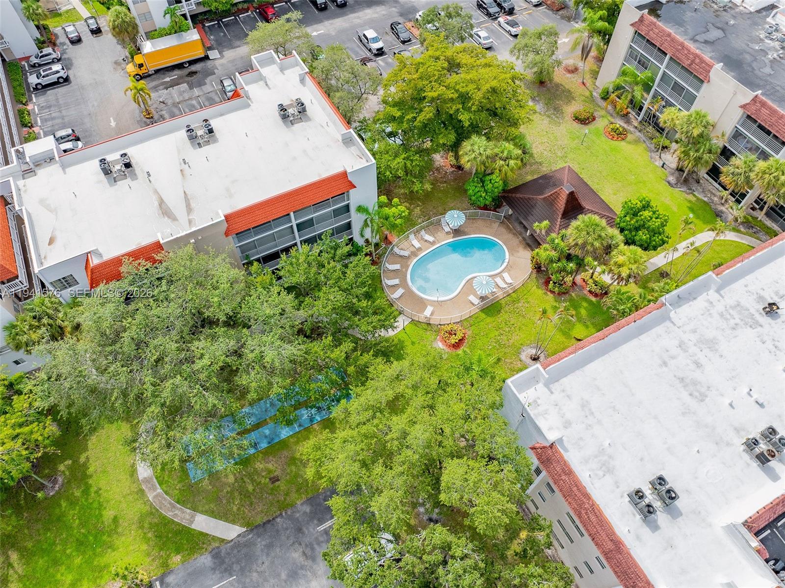 3581 Inverrary Drive, Unit 308 Lauderhill, FL 33319 - Photo 15 of 43 an aerial view of a house with a yard basket ball court and outdoor seating