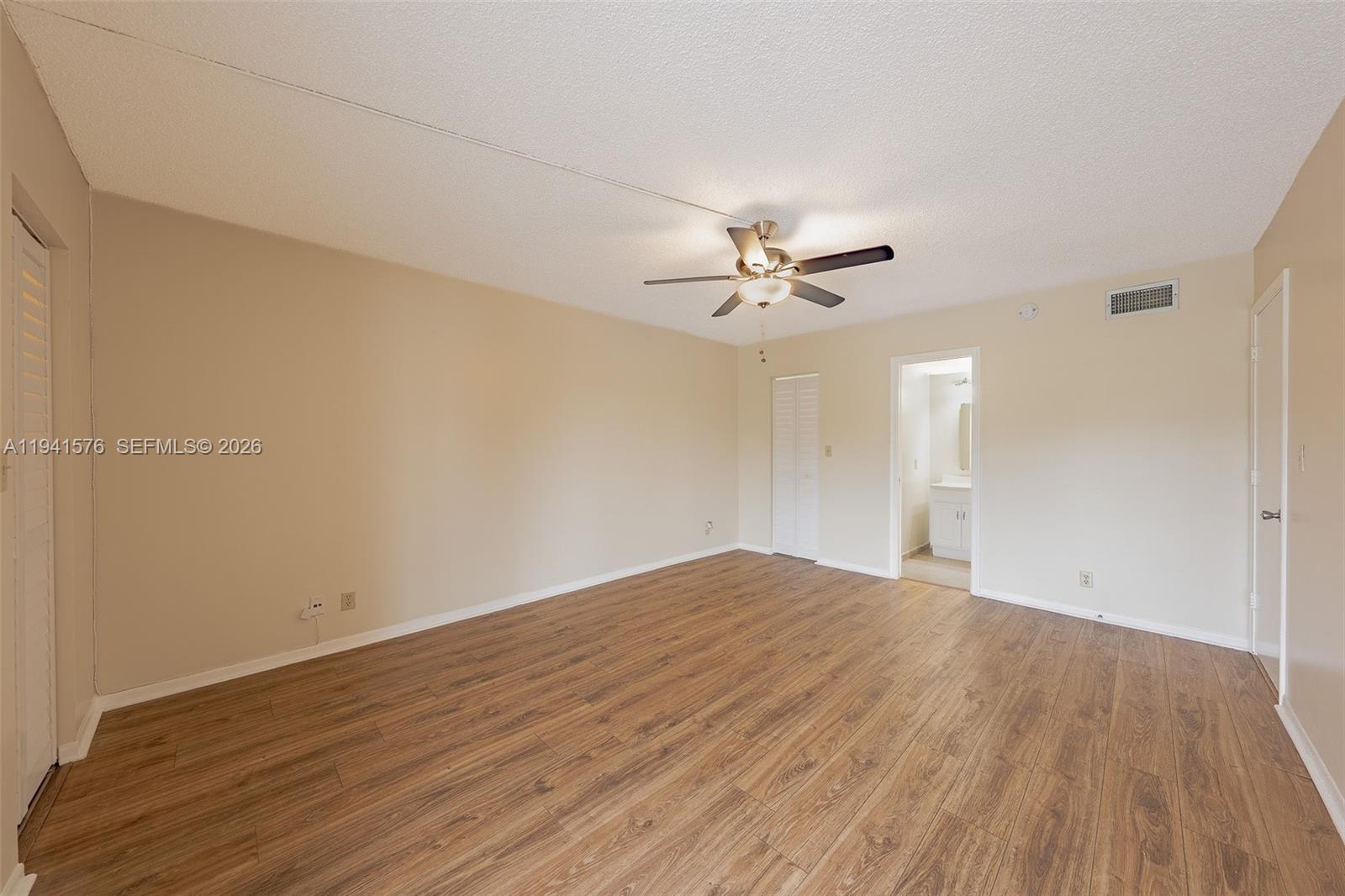 3581 Inverrary Drive, Unit 308 Lauderhill, FL 33319 - Photo 38 of 43 a view of empty room with wooden floor