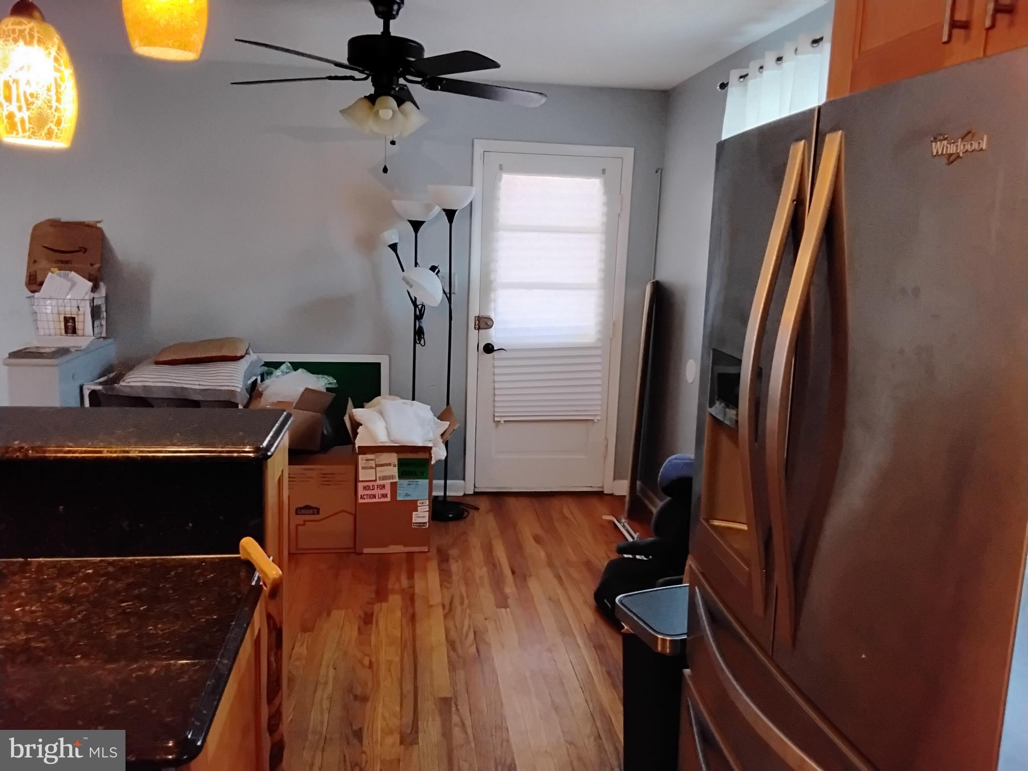 11422 Brandywine Road Clinton, MD 20735 - Photo 5 of 18 a view of a workspace with furniture and a window