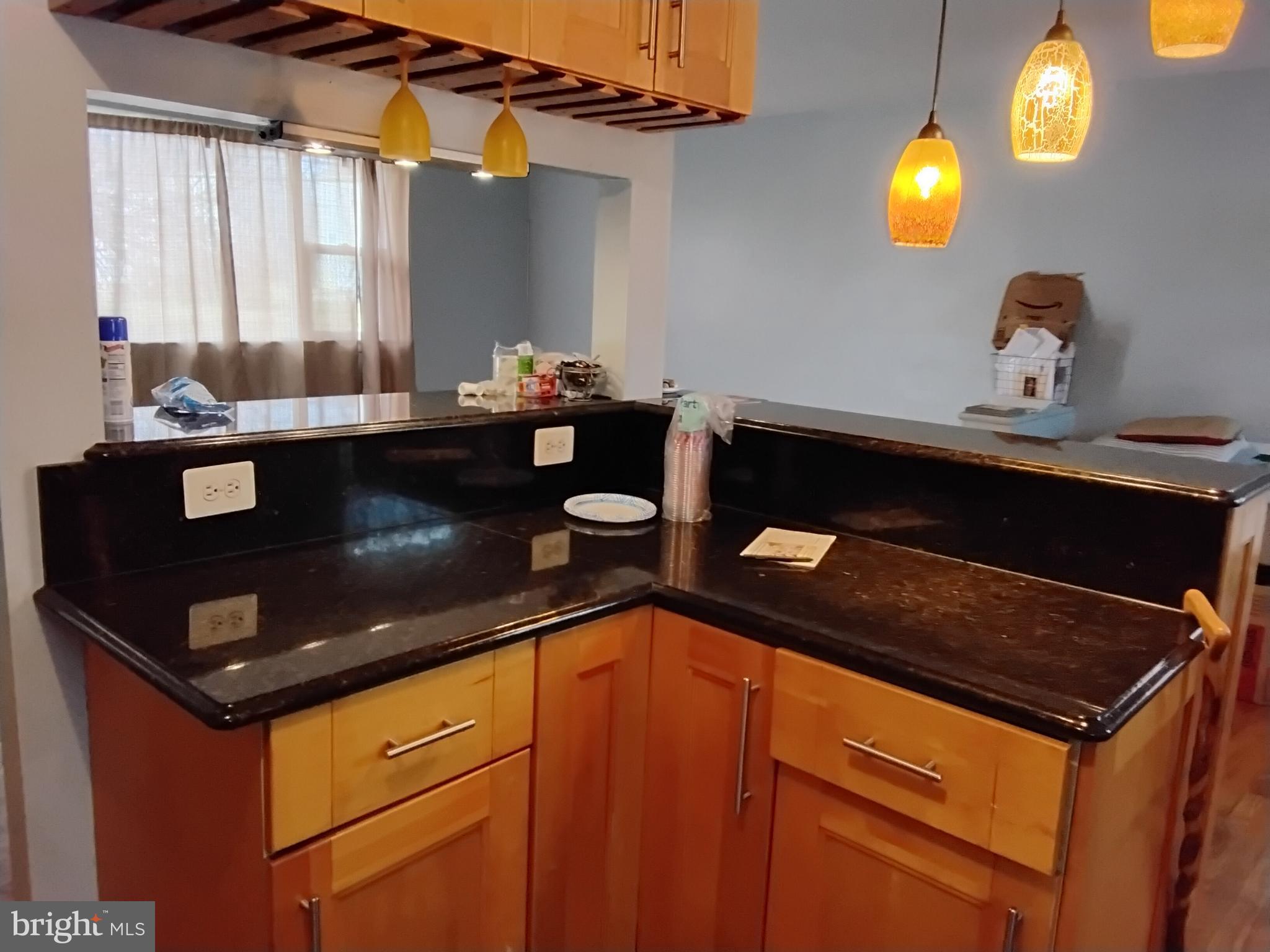 11422 Brandywine Road Clinton, MD 20735 - Photo 10 of 18 a kitchen with a sink cabinets and window