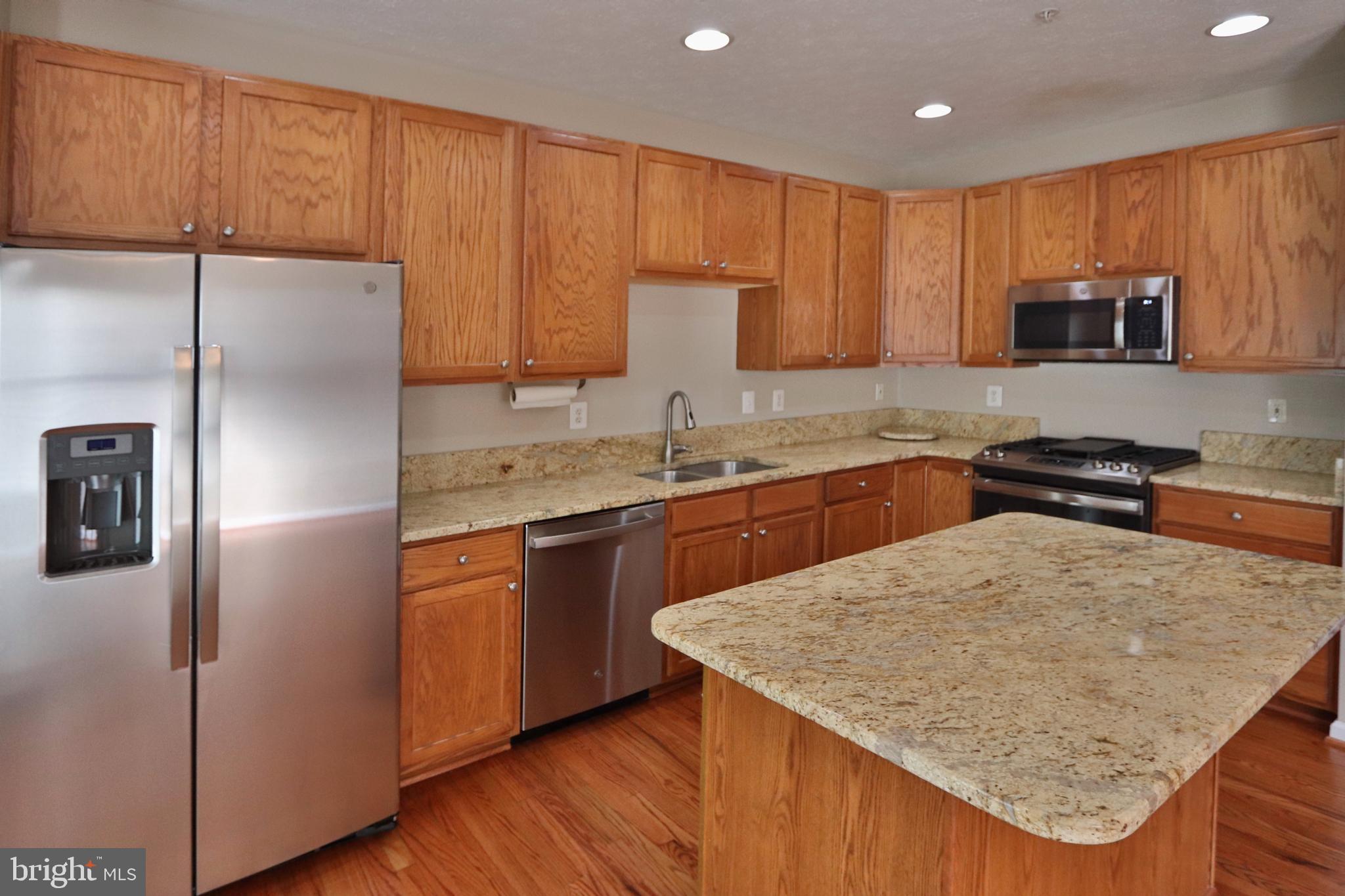 5007 Kemsley Road Baltimore, MD 21237 - Photo 4 of 22 Kitchen with brand new stainless steel appliances